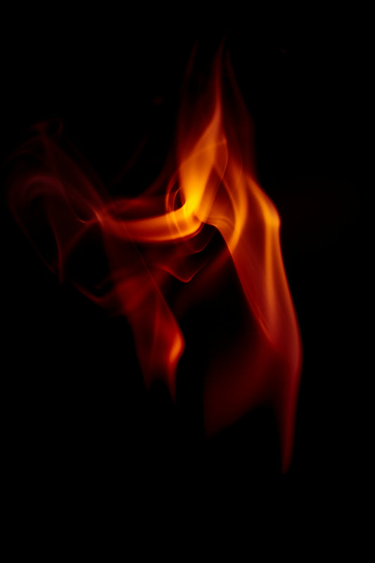 a black background with red and yellow flames