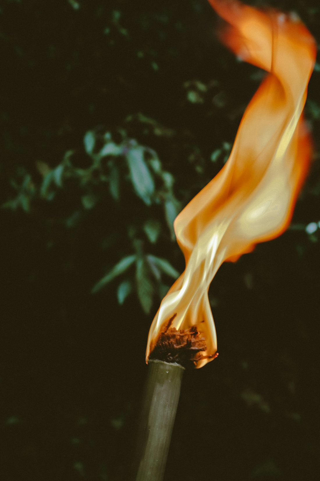 a close up of a match being lit by a match stick