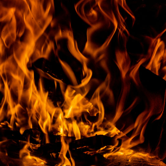 a close up of a fire with lots of flames